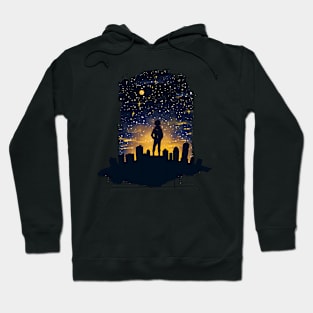 A silhouette of a person stargazing Hoodie